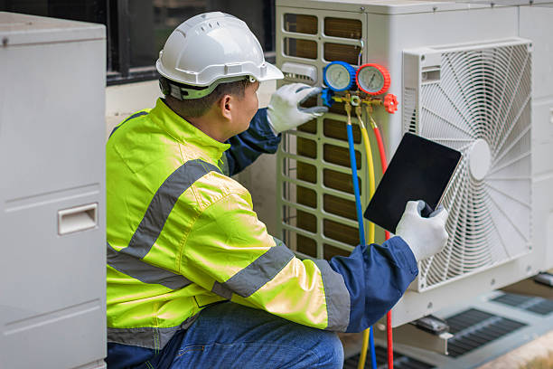 Professional Hvac technician working in London, OH